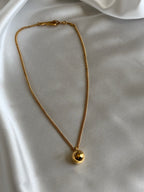Chanel Gold Ball Pendant Necklace