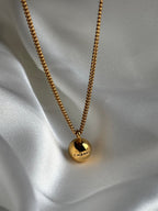Chanel Gold Ball Pendant Necklace